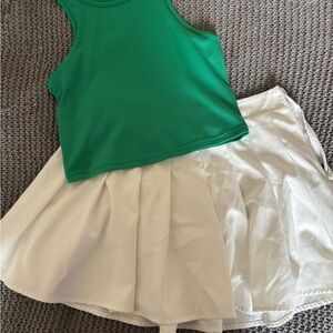 Green Tank Top and White Pleated Skirt